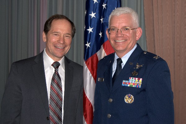 Together at the February chapter luncheon are Spencer Bauer, chapter president, and guest speaker Col. William R. Hodgkiss, director of Launch and Range Systems Directorate, Space and Missile Systems Center, Air Force Space Command, Los Angeles Air Force Base, California.